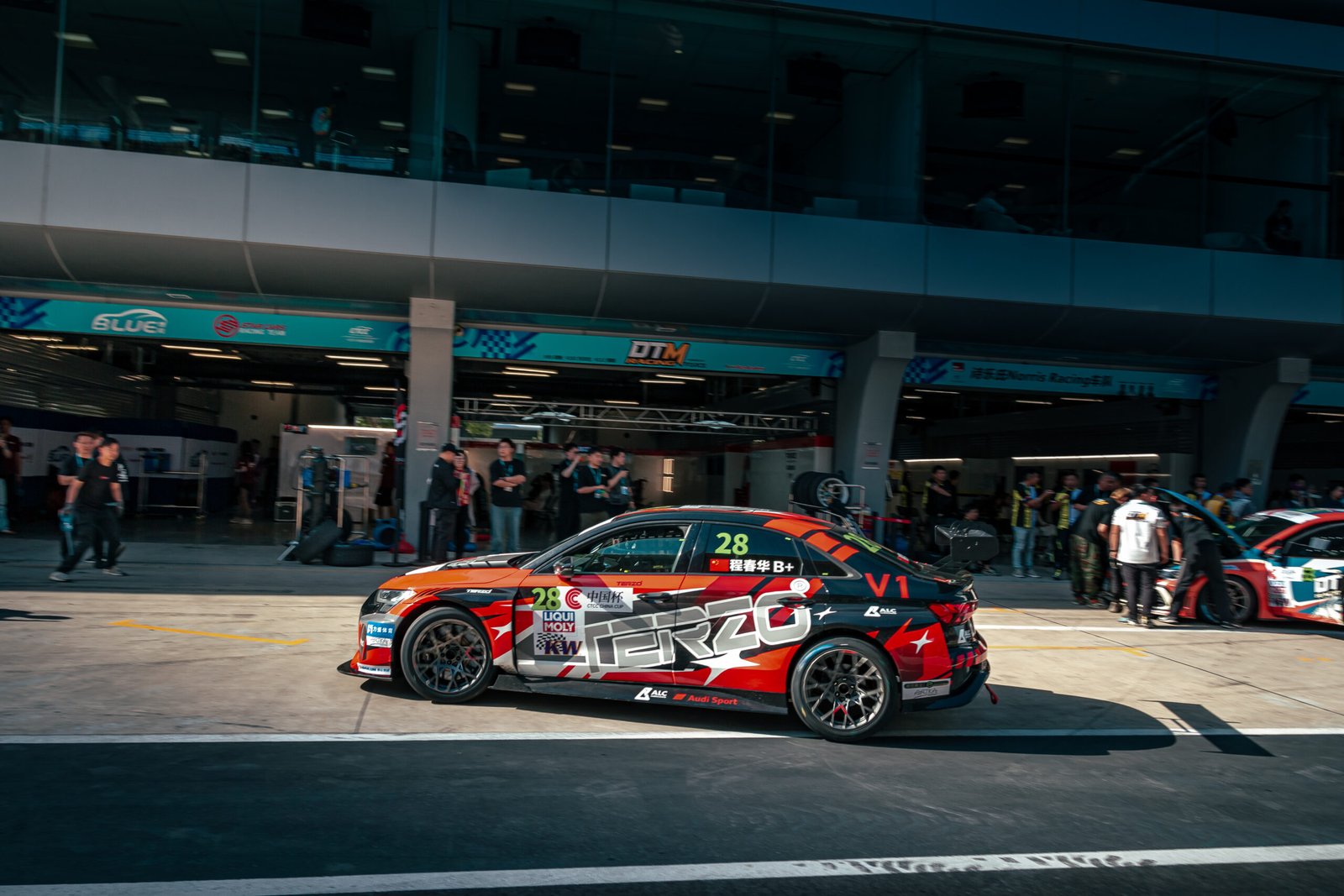 Cheng Chunhua driving the TERZO racing car is clearly visible